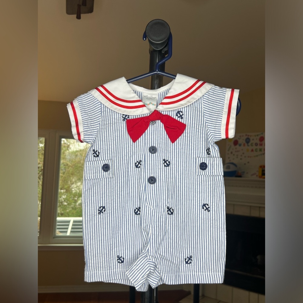 Nautical-themed onesie from brand “starting out.” Size 3M. Like new.